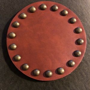 Two leather studded coasters